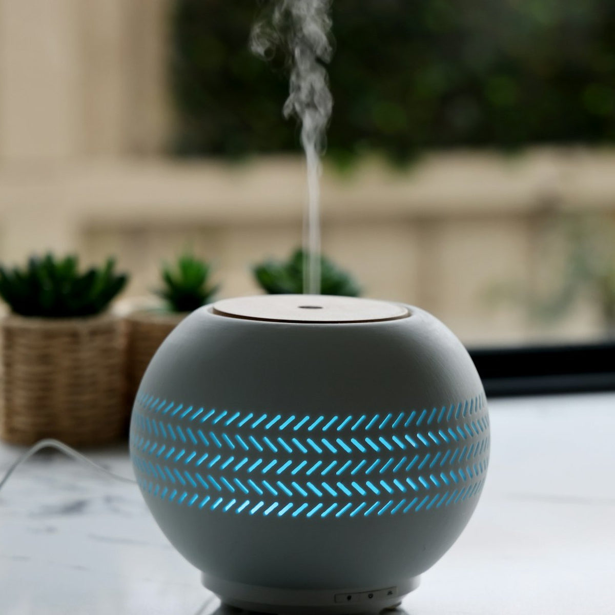 Aromadiffusor mit blauem Licht